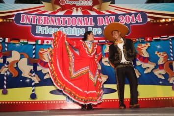 Two exchange students performing Mexican traditional dance. 